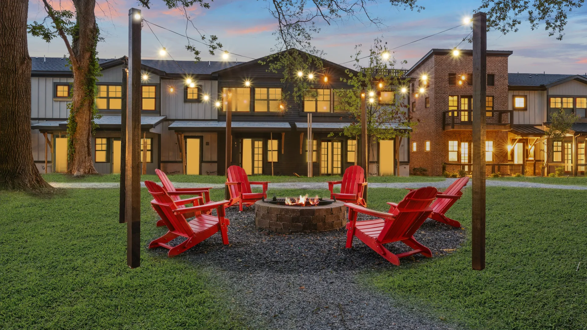a building with a few tables and chairs outside