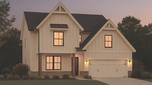 Modern two-story farmhouse with illuminated windows, white siding, and a double garage at dusk.